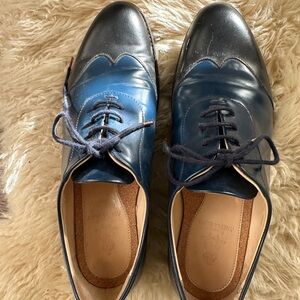 The Office of Angela Scott Wing Tip Shoes
